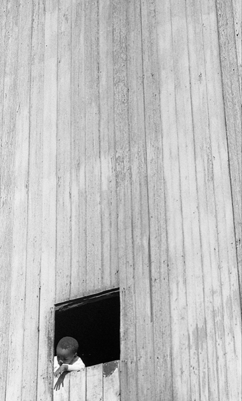 Boy in the Window on Aluminum by Howard D. Simmons